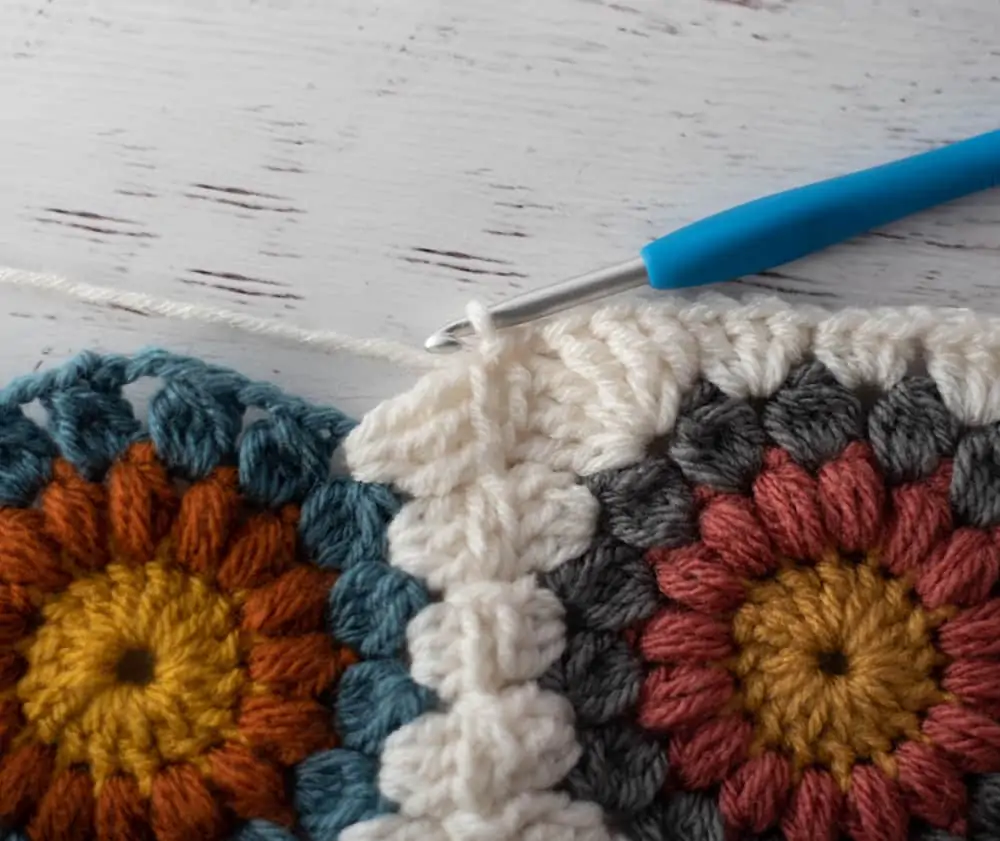 Joining crochet afghan squares with blue crochet hook