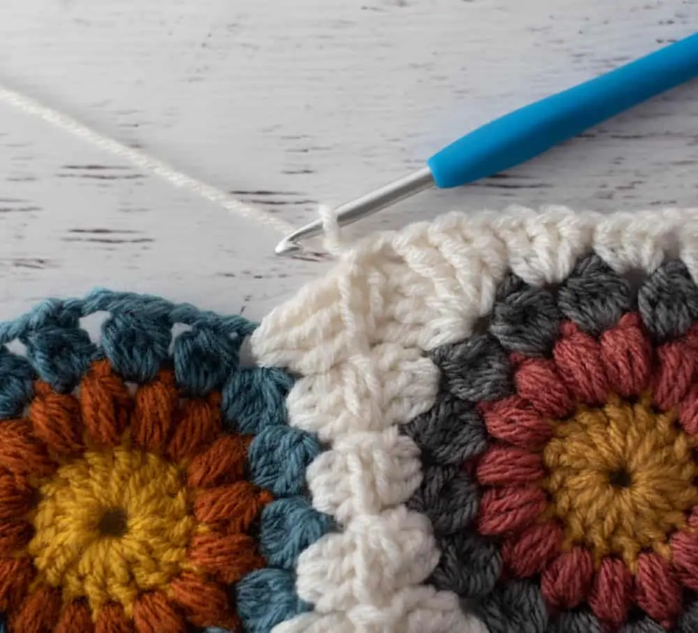 Joining crochet afghan squares with blue crochet hook