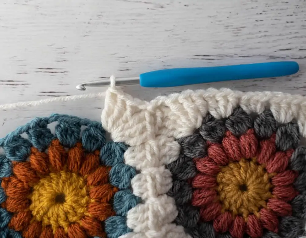 Joining crochet afghan squares with blue crochet hook