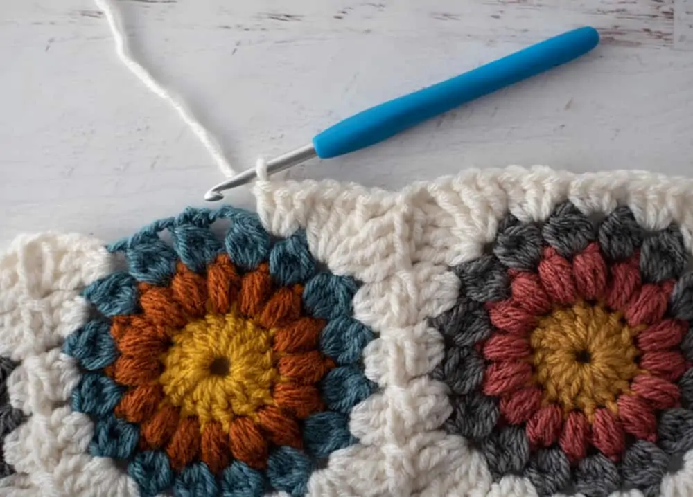 Joining crochet afghan squares with blue crochet hook