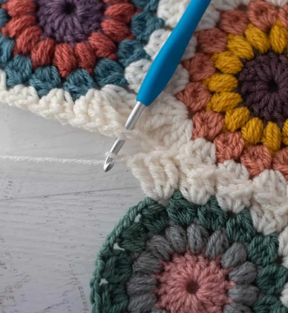 Joining crochet afghan squares with blue crochet hook