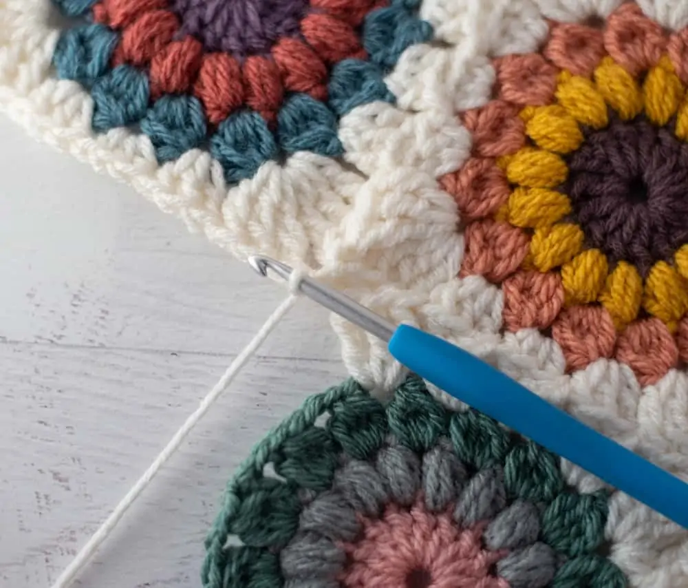 Joining crochet afghan squares with blue crochet hook