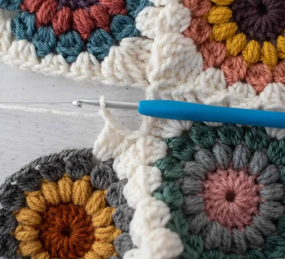 Joining crochet afghan squares with blue crochet hook