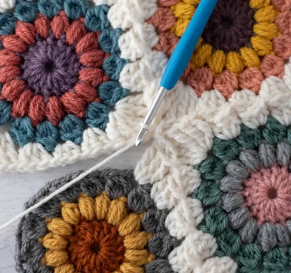 Joining crochet afghan squares with blue crochet hook