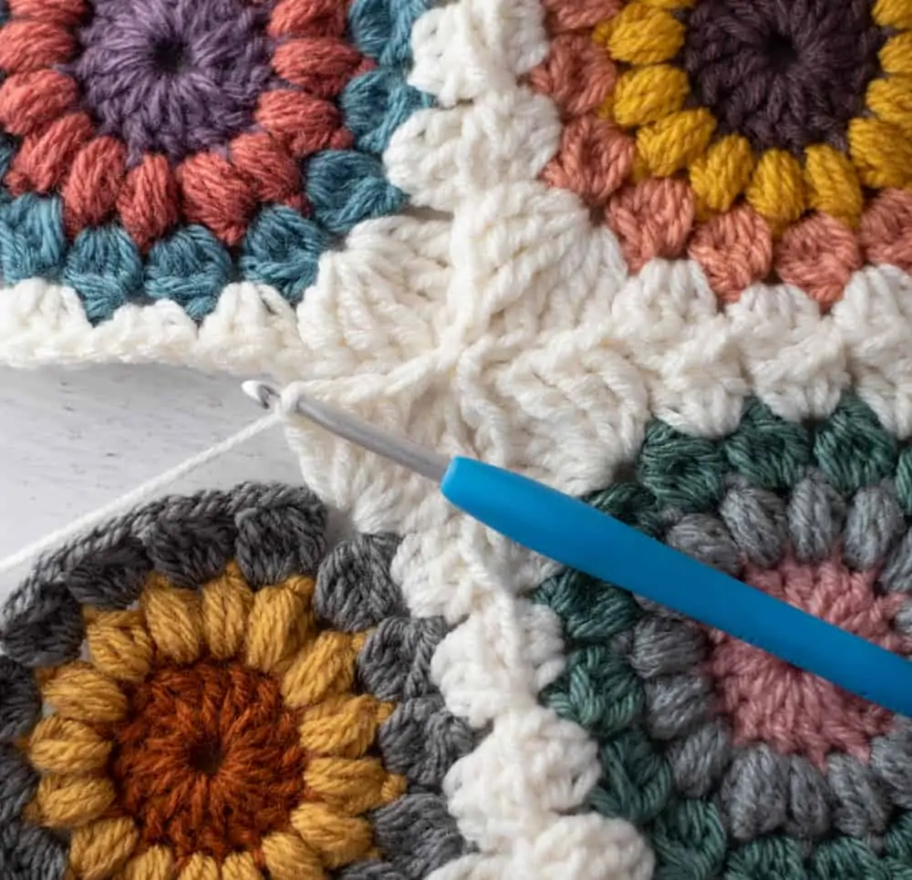 Joining crochet afghan squares with blue crochet hook