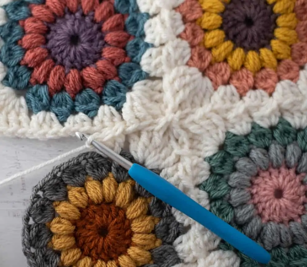 Joining crochet afghan squares with blue crochet hook