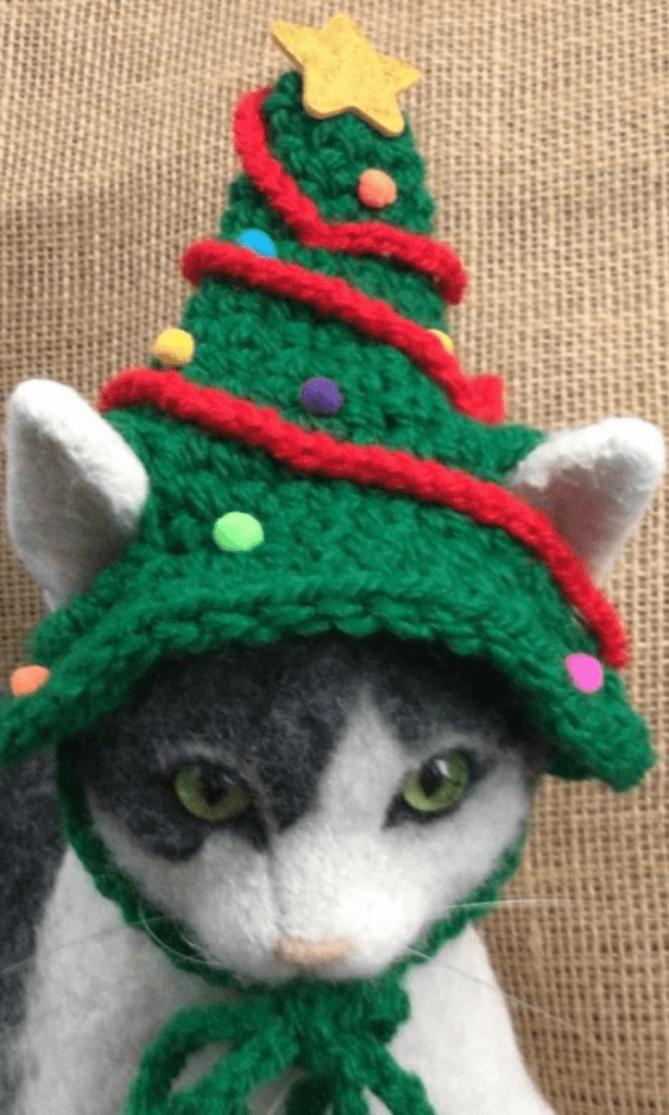 cat with christmas tree hat