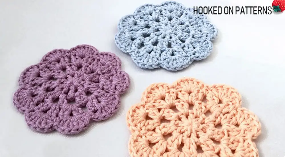 peach, pink and blue crochet coasters