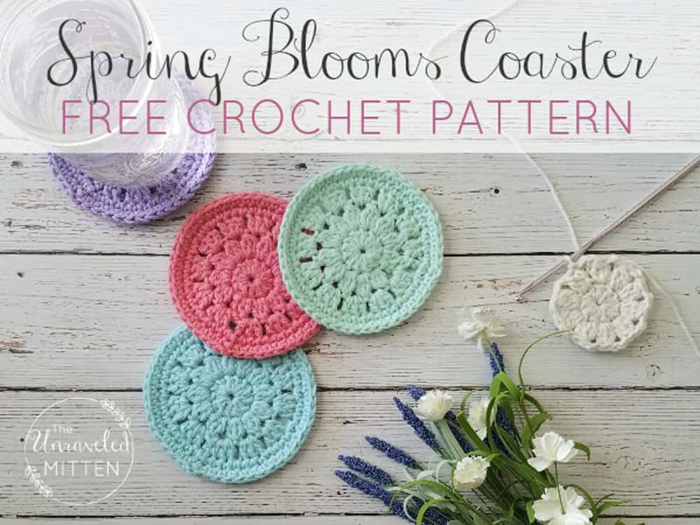 pastel color crochet coasters with crochet hook and flowers