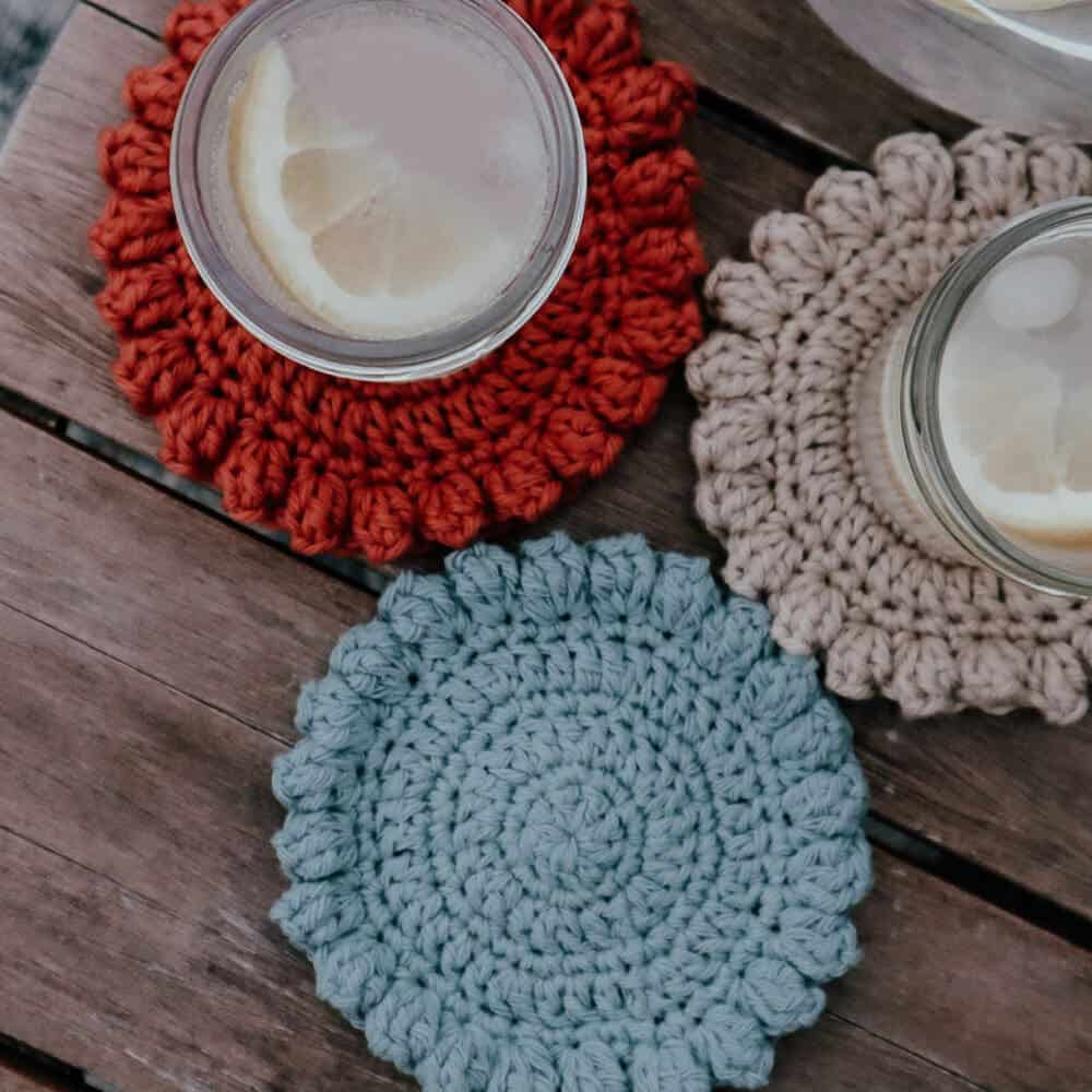 red, blue and gray coasters with lemonade