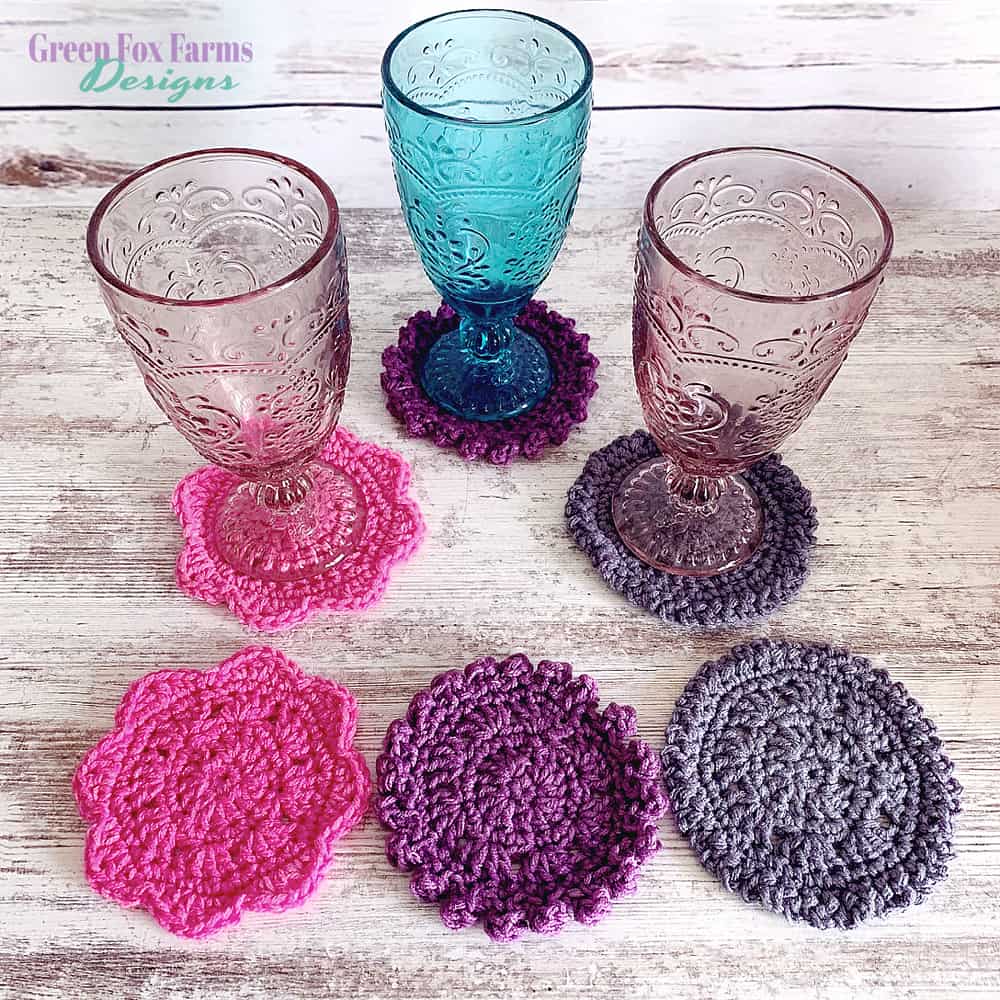 Pink and purple crochet coasters with glasses
