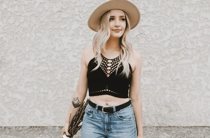 Black bralette with an almost fish net neckline