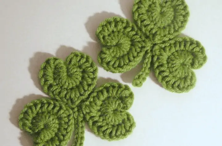 two shamrock coasters