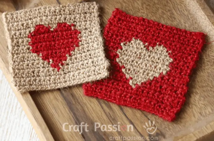 two square coasters with hearts