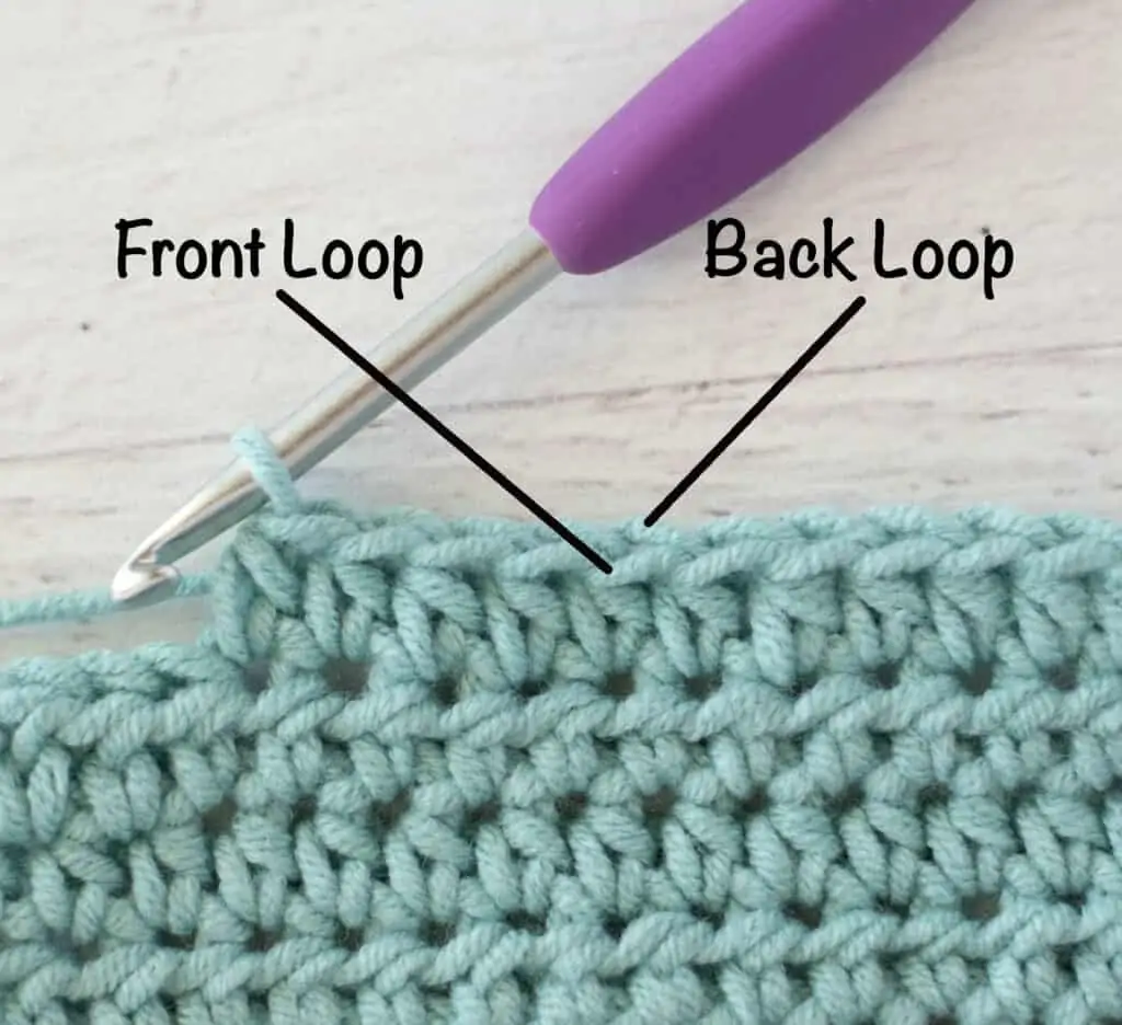 blue crochet half double crochet sample with silver and purple crochet hook