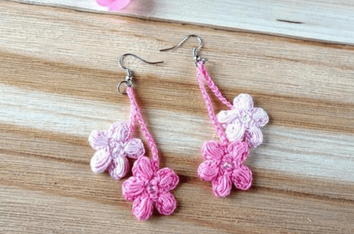 Crochet Earrings that feature dangling flowers.