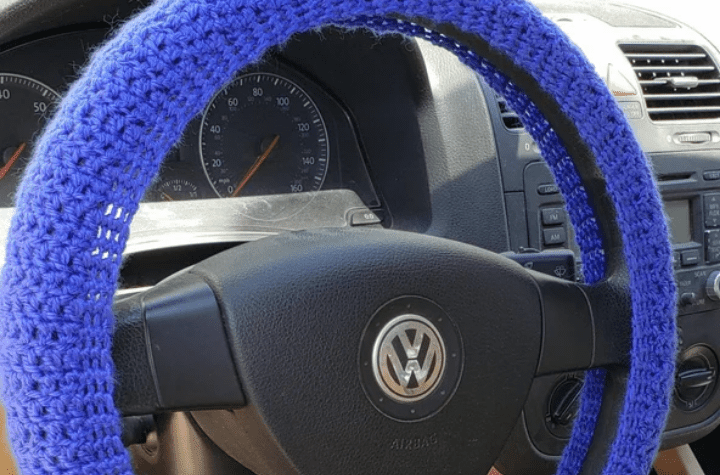 Solid, beginner friendly crochet steering wheel cover.