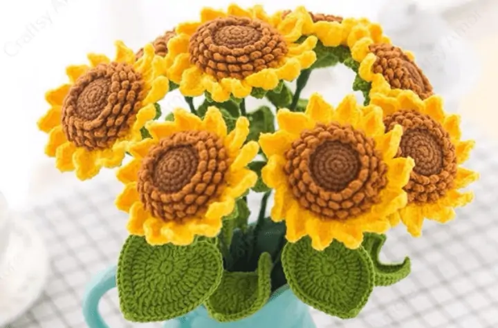 Crochet sunflowers in a blue vase