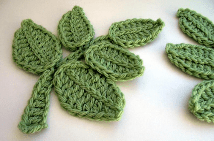 A large 2D crochet leaf branch.