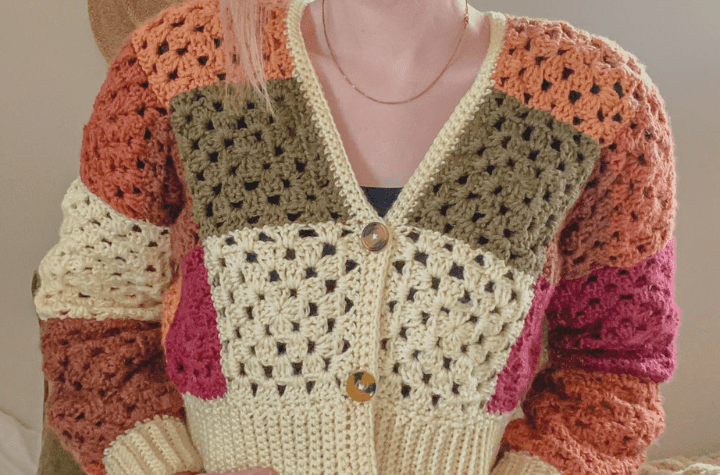 Cropped granny square cardigan featuring patchwork colors.