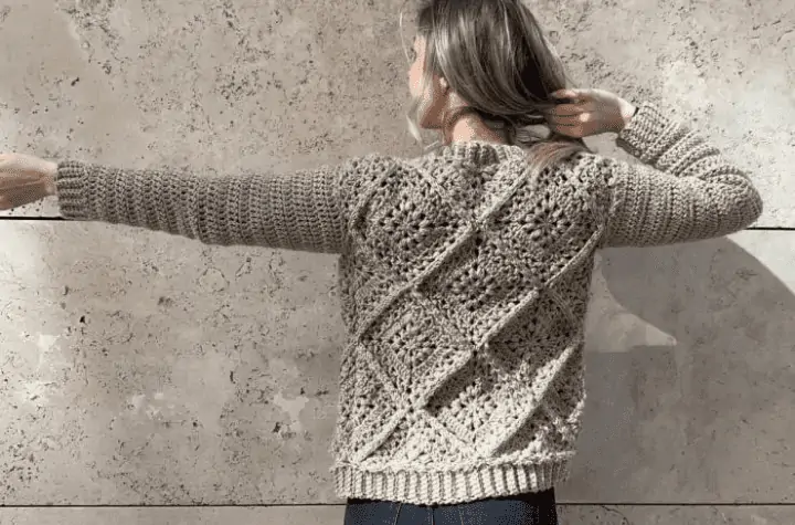 Beige granny square-style cardigan.