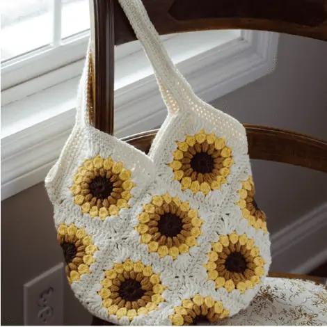Yellow, brown and cream crochet Sunflower Bag on Chair