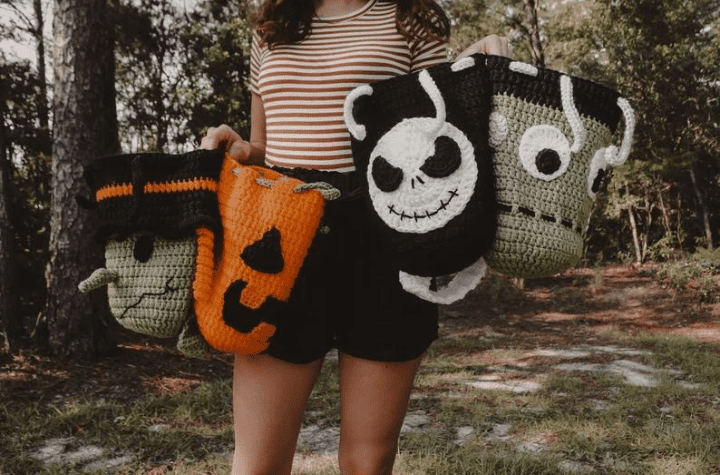 A witch, pumpkin, skeleton, and frankenstein's monster treat bag.