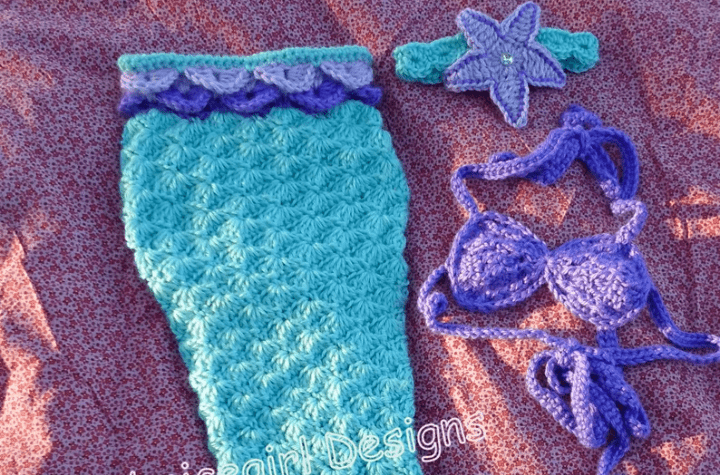 Crochet mermaid costume with a shell bra and star headband.