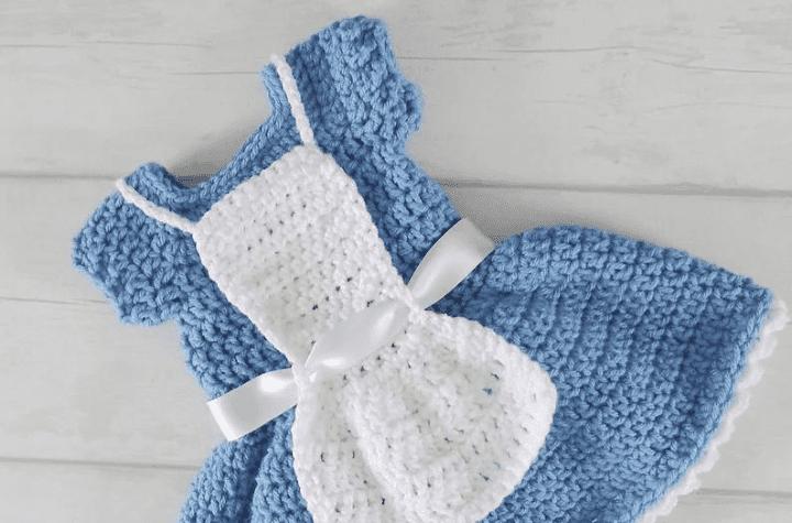 Little blue alice in wonderland inspired crochet dress.
