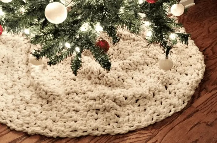 Circular tree skirt that's all white.