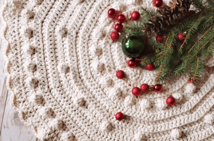 A small tree skirt with little crochet bobbles as accent points.