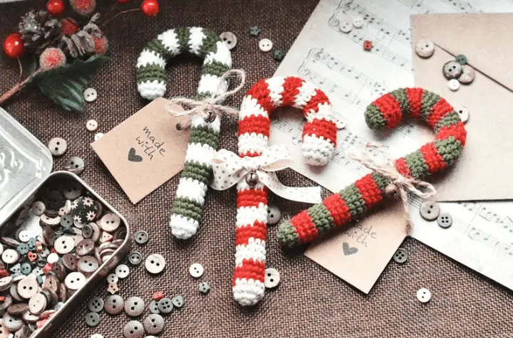 Three candy canes, one green and white, one red and white, and one red and green.