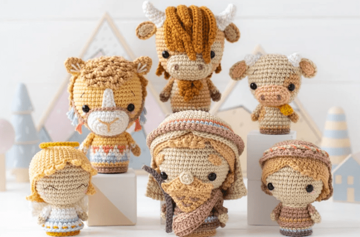 Crochet nativity scene with little doll faces.