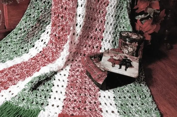 vintage looking Christmas crochet afghan with color coordinated fringe.