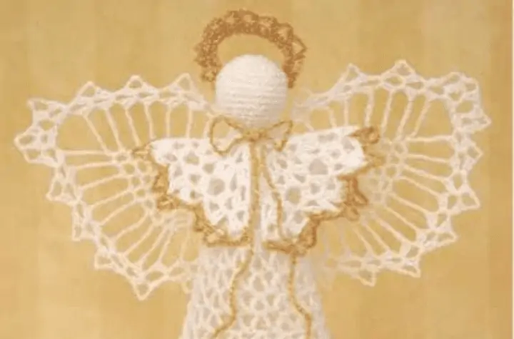 A lace crochet angel tree topper.