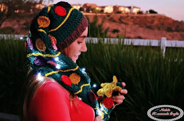 elf-style crochet christmas tree hat with large circular ornaments.