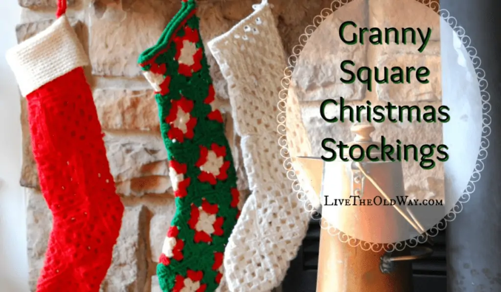 Three granny square stockings, one that is all red, one that is green, red, and white, one that is all white.