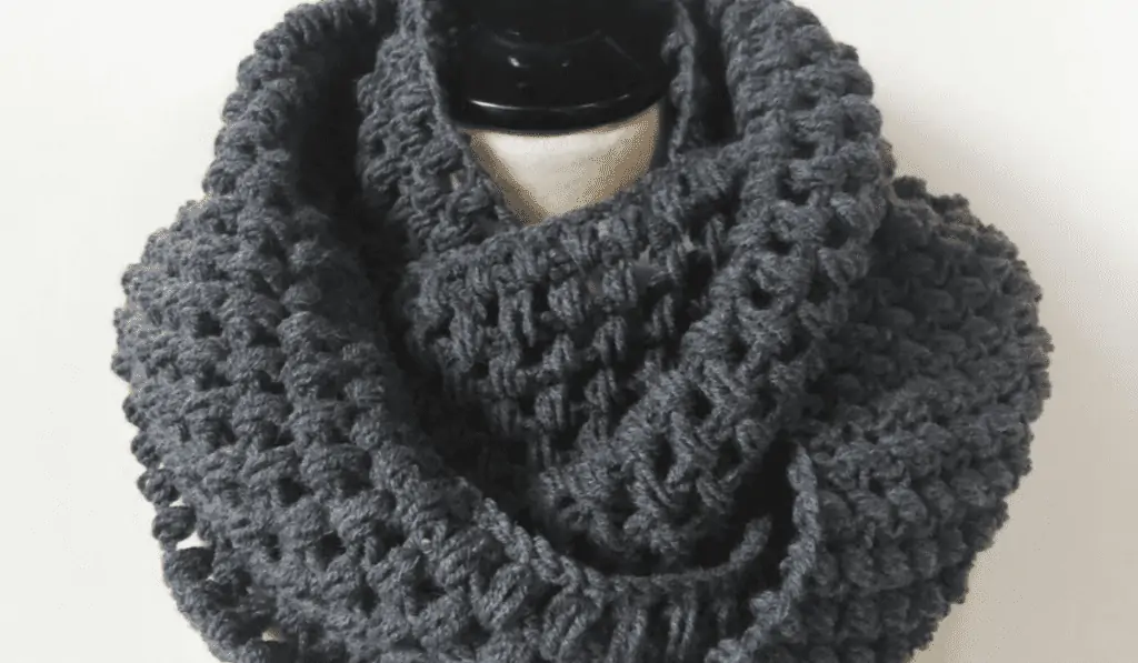 Dark grey crochet infinity scarf.