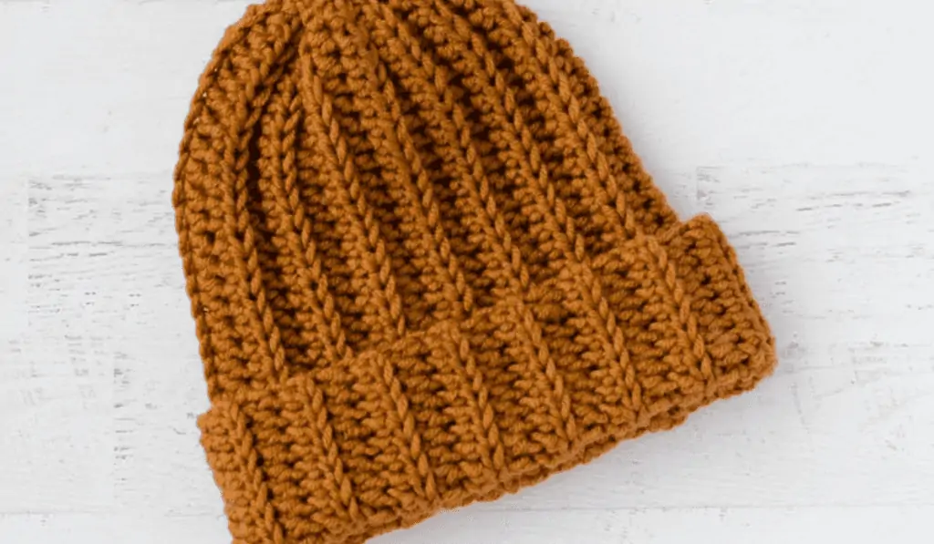 Orange ribbed beanie.