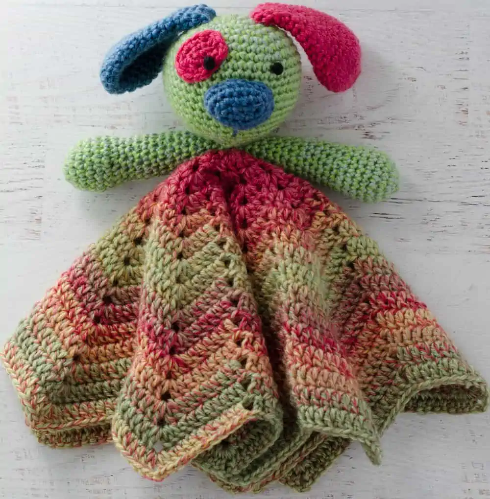 Crochet baby lovey puppy in green, pink and blue