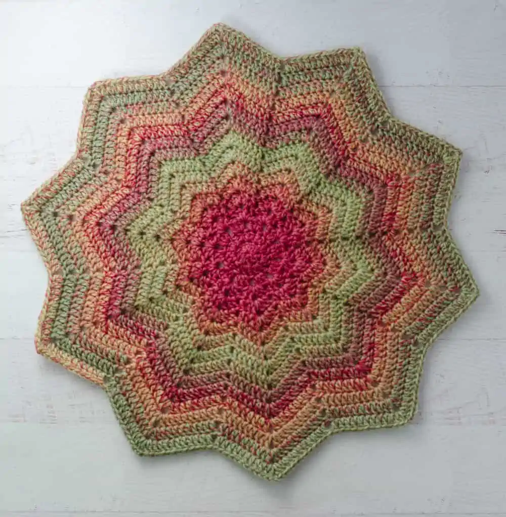 Crochet baby lovey blanket in green, pink and blue