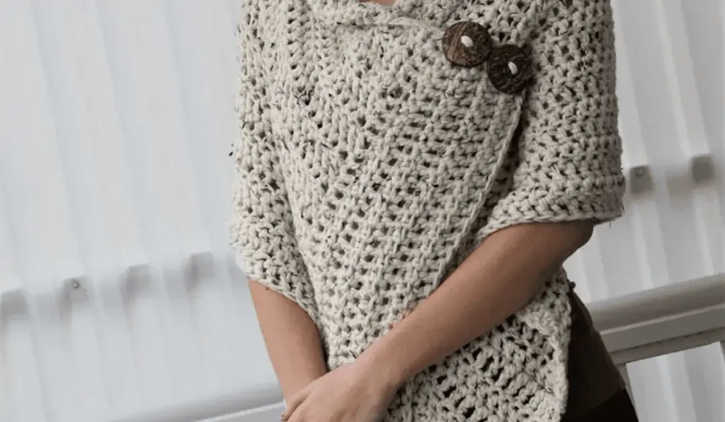 Off white crochet shawl with two brown buttons