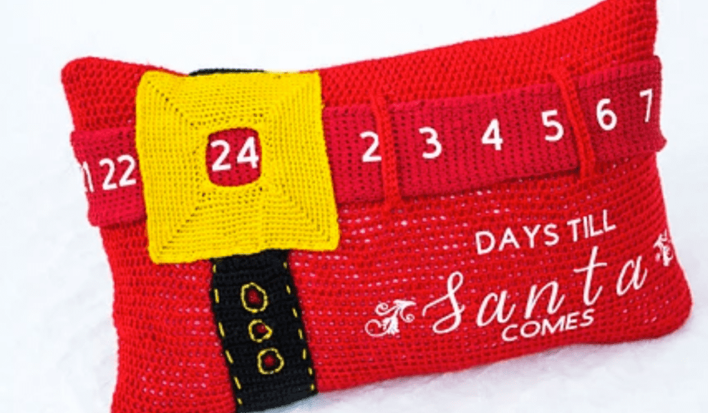 A pillow with a slider to countdown until Santa comes.