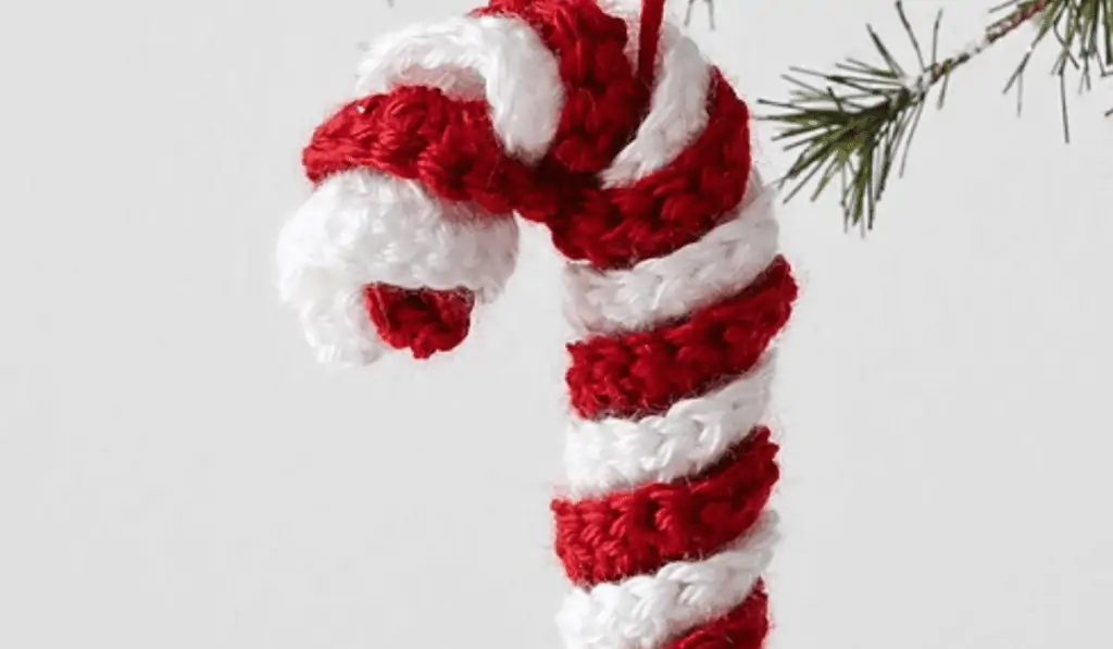 A crochet candy cane ornament.