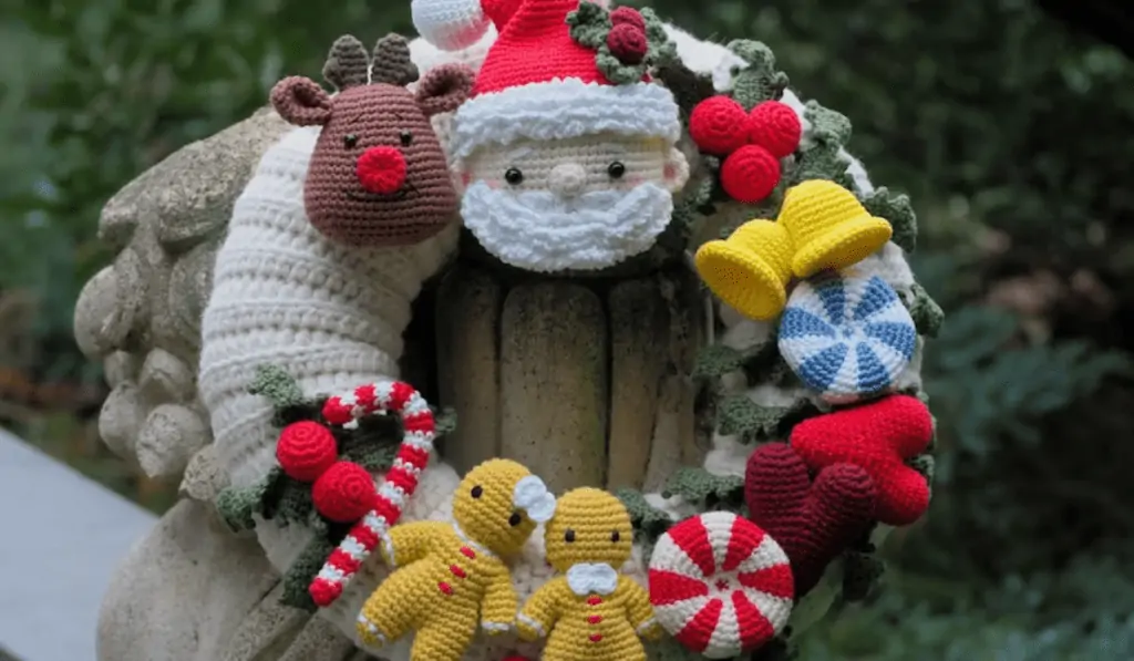 A white crochet wreath, a reindeer, Santa, holly berries, bells, peppermint candies, crochet hearts, gingerbread men, and candy canes.