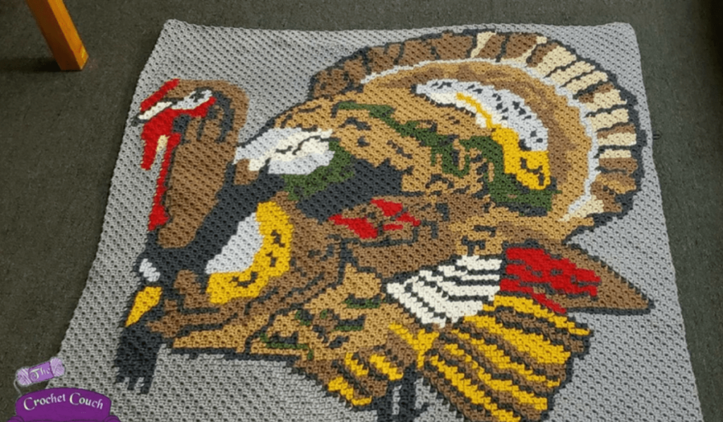 A C2C blanket with a realistic-looking turkey on it.