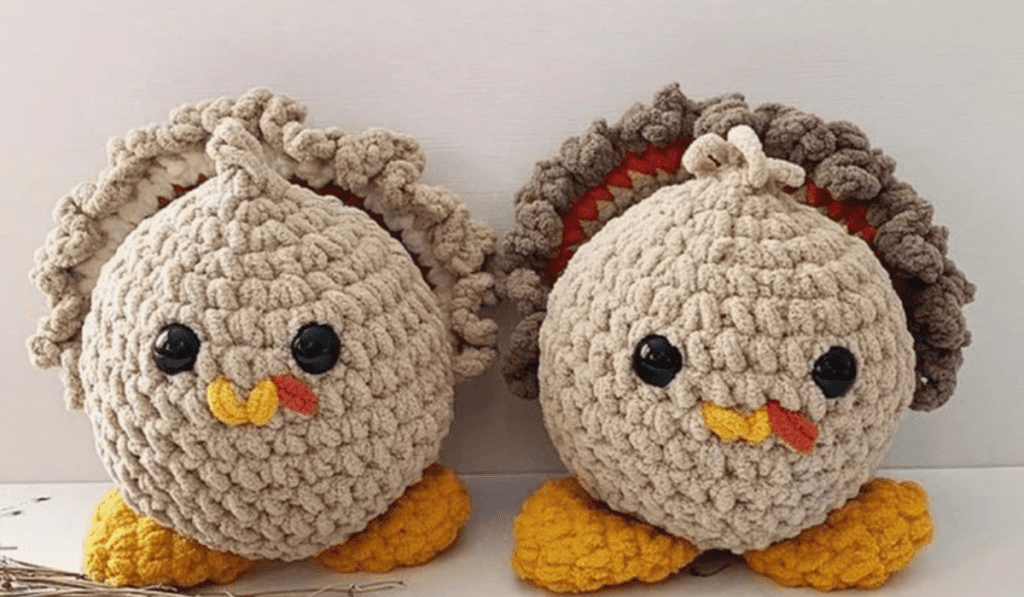 Circular crochet turkey amigurumis with ruffles in the place of feathers.