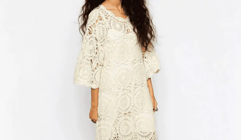 A boho style dress with circular crochet details.