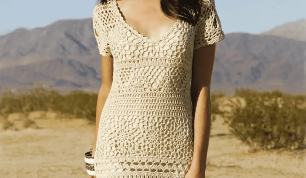 A scalloped v-neck with crocheted lace.