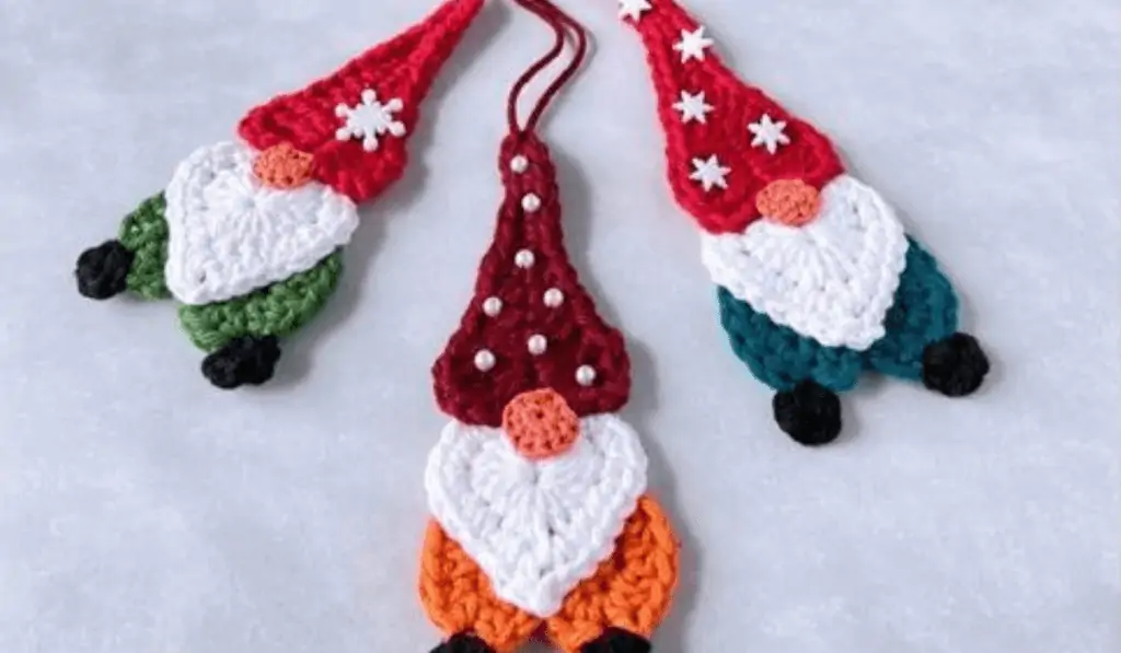 three crochet flat gnome ornaments